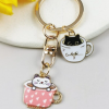Metallic Oil Drop Design Cat & Teacup Shaped Keychain