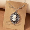 Figure Decor Oval Pendant Necklace